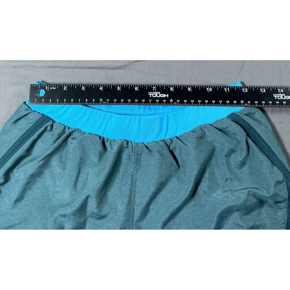 Under Armour Womens Fly By HeatGear Running Shorts Teal Blue Small Loose Fit